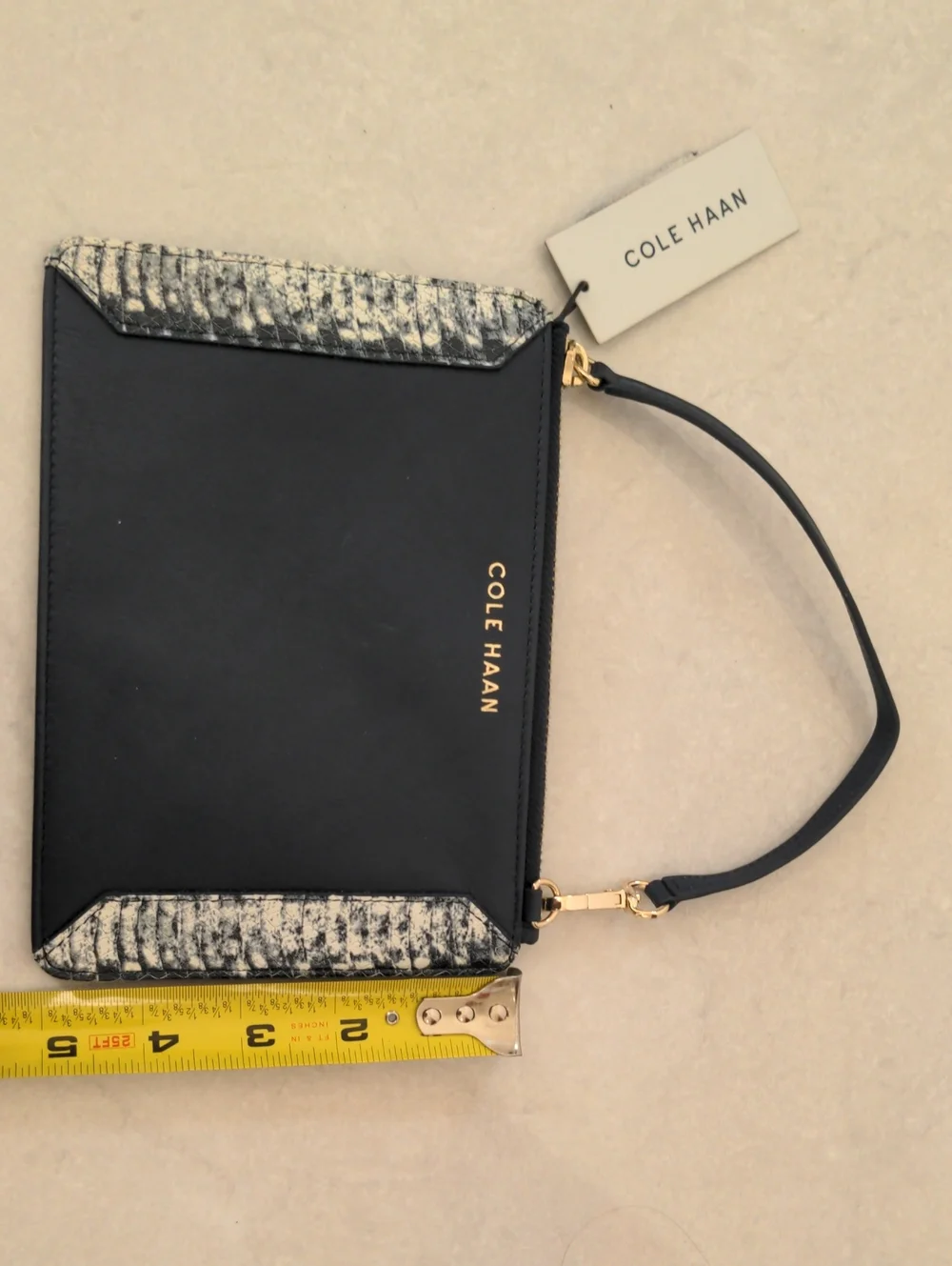 Cole Haan compact wristlet